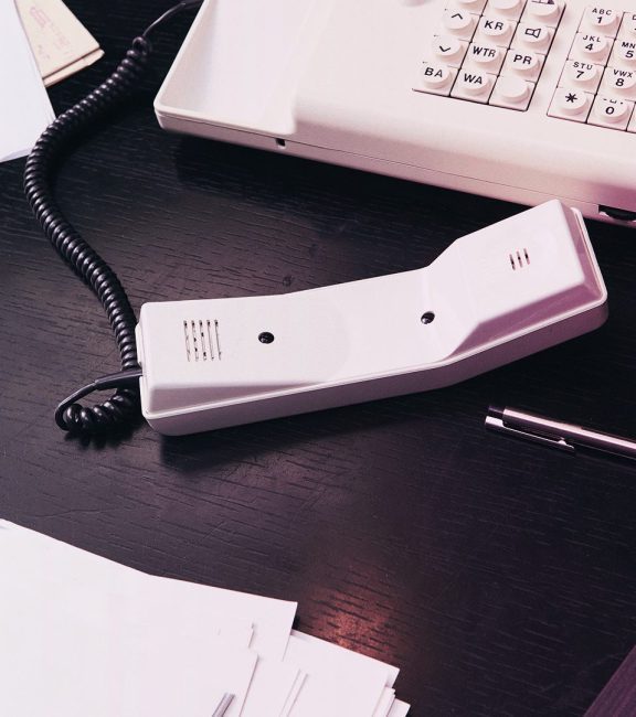 image of desk and phone IA
